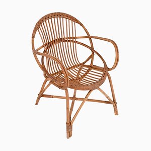 Butaca italiana Mid-Century con forma de concha de ratán y bambú de Franco Albini, años 50