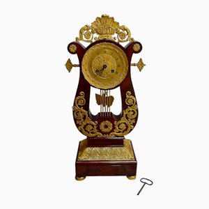 Empire Lyre Pendulum in Mahogany and Gilded Bronze