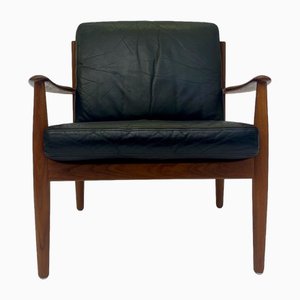 Mid-Century Danish Teak and Black Leather Armchair by Grete Jalk for France & Søn, 1960s