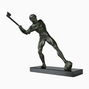 Leñador de bronce con hacha de principios del siglo XX, años 20