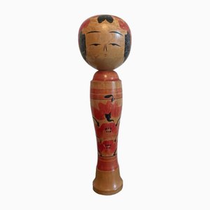 Bambola Kokeshi vintage giapponese in legno a forma di rosso