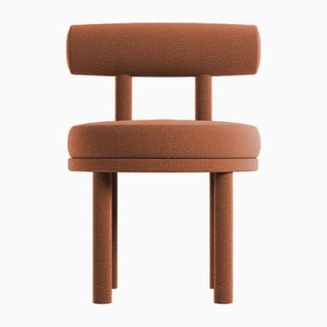 Collector Moca Chair in Boucle Burnt Orange by Studio Rig