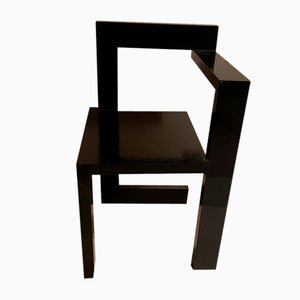 Sedia Steltman con braccio sinistro di Gerrit Rietveld, anni '70