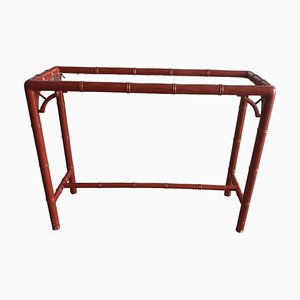 Consola vintage de bambú sintético lacado en rojo