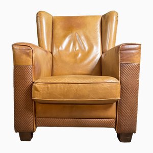 Poltrona vintage Wingback in pelle marrone