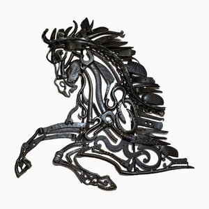 Illustrazione di un cavallo in metallo di Libecq, anni 2010