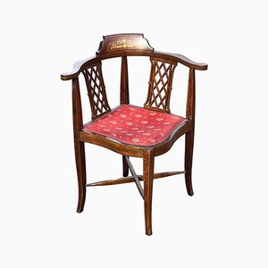 Antiker Sessel aus Mahagoni mit Intarsien