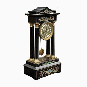 Reloj Boulle francés con lomos en una campana