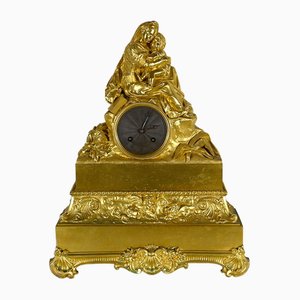 Early 19th Century Golden Bronze Pendulum the Virgin with the Chair