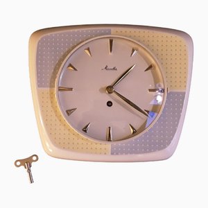 Mid-Century German Machanical Wall Club Clock in Cream-Colored Ceramic with Yellow-Blue Decor from Mauthe, 1950s