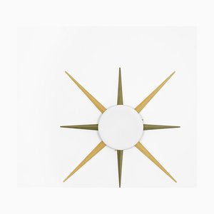 Lampada da parete Windrose Collezione Solare in metallo cromato opaco di Design per Macha