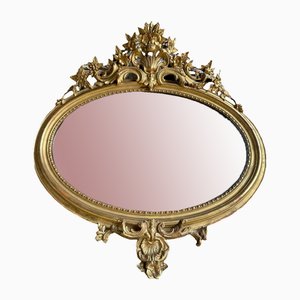 Espejo Luis XV oval grande de madera dorada