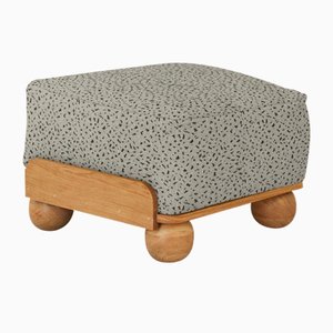 Cove Footstool in Monchrome Super Granite by Fred Rigby Studio