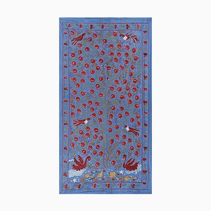 Camino de mesa Suzani de seda azul con diseño de granada