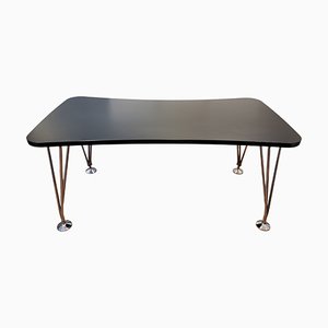 Mesa de comedor de Piet Hein para Fritz Hansen, años 60