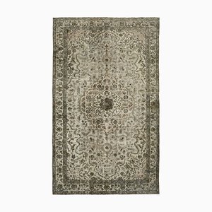 Tapis gris surteint