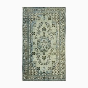 Tapis bleu surteint