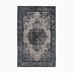 Tapis gris surteint