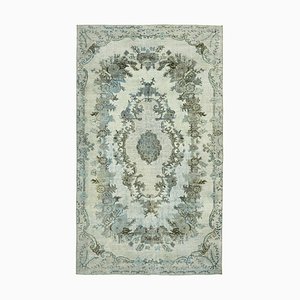 Tapis bleu surteint