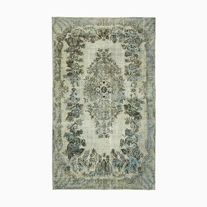 Tapis bleu surteint