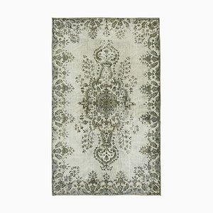 Tapis gris surteint