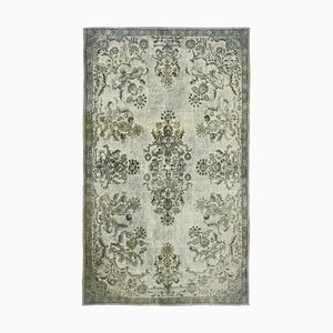 Tapis gris surteint