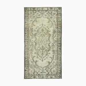 Tapis gris surteint