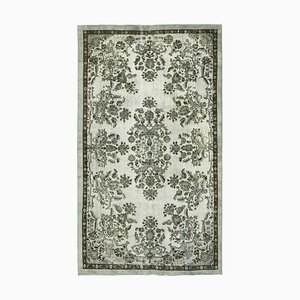 Tapis gris surteint