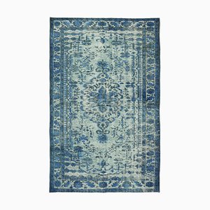 Tapis bleu surteint