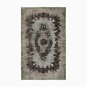 Tapis gris surteint