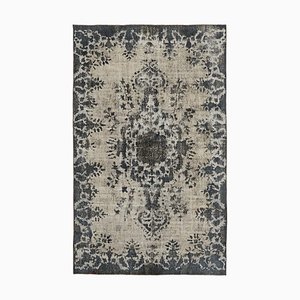 Tapis gris surteint