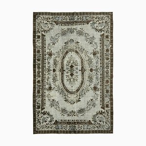 Tapis gris surteint