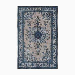 Tapis bleu surteint