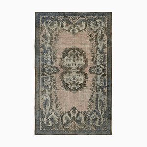 Tapis gris surteint