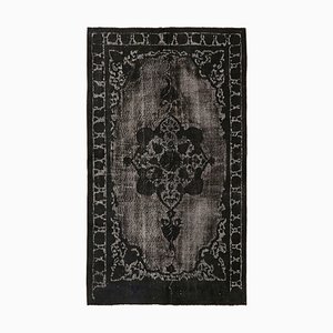 Tapis gris surteint