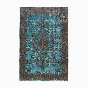 Tapis bleu surteint