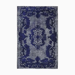 Tapis bleu surteint