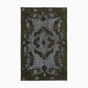 Tapis gris surteint