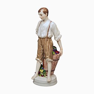 W 129 Boy and Dosser with Winegrapes Figurine by Theodore Eichler for Meissen, 1890s