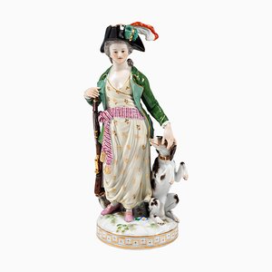 Figura de sirvienta rococó de Meissen con perro de Johann Carl Schoenheit, década de 1880