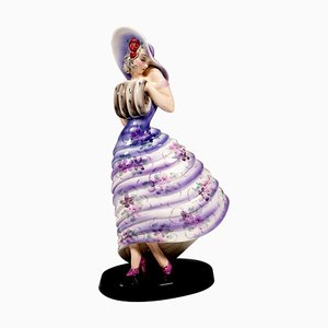 Elegant Lady with Cufflink Figurine by Claire Weiss for Goldscheider Manufactory of Vienna, 1932s