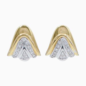 Aretes de oro amarillo y blanco de 18 kt con diamantes, años 60. Juego de 2