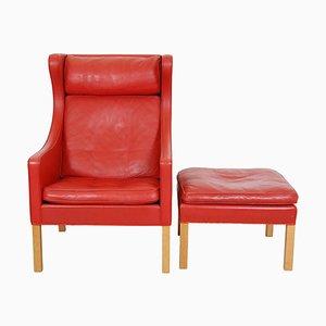 Vintage Stuhl aus rotem Leder mit Fußhocker von Børge Mogensen für Fredericia, 1980er, 2er Set