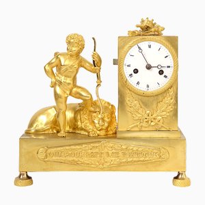 Orologio a pendolo trionfante in bronzo dorato, inizio XIX secolo