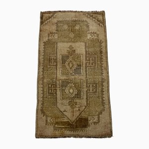 Small Vintage Turkish Tan Wool Mat Rug