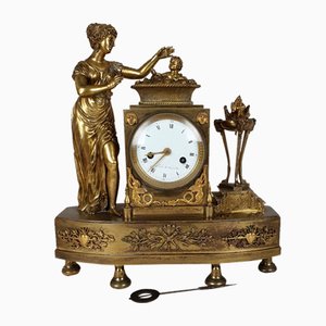 Reloj de bronce con el nacimiento del rey de Roma, siglo XIX