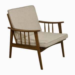 Skandinavischer Sessel mit geschwungenen Armlehnen & grauem Stoff, 1960er