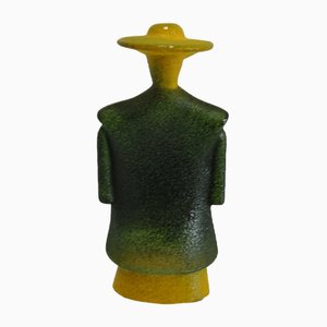 Escultura de poncho verde de Kosta Boda, años 80