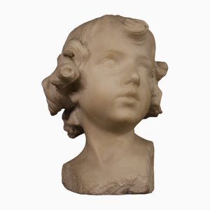 D. Razeti, Escultura de cabeza de querubín, 1900, Mármol