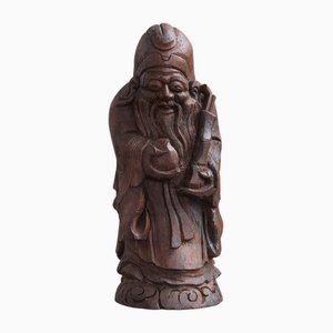 Figura religiosa china de madera clara, años 60